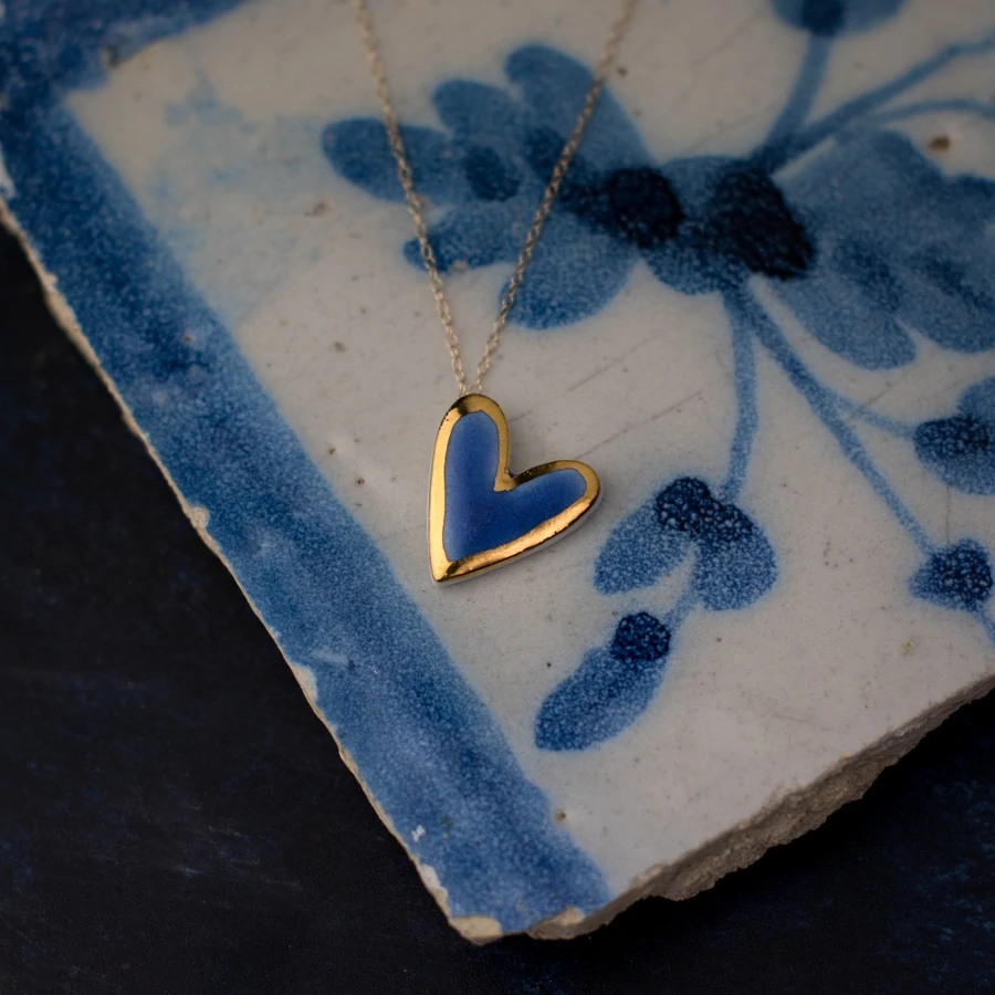 A blue shaped ceramic pendant heart necklace